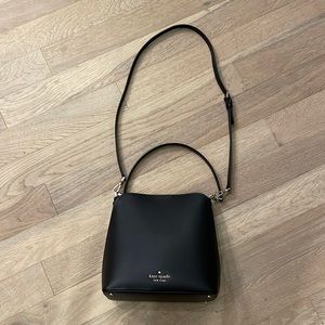 Kate spade black bucket like crossbody purse. Silver hardware
